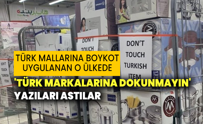Türk mallarına boykot uygulanan o ülkede  'Türk markalarına dokunmayın' yazıları astılar