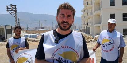 Hatay'da ücret alamayan işçiler çatıya çıktı: İki işçi gözaltına alındı