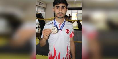 Cihan Doğu, Muay Thai'da Dünya Şampiyonu