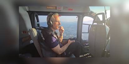 Uraloğlu, yangın bölgesini helikopterle denetledi