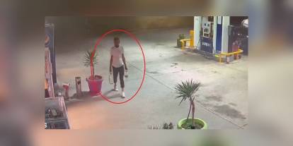Orhaneli yangını şüphelisinin benzini aldığı anlar güvenlik kamerasında